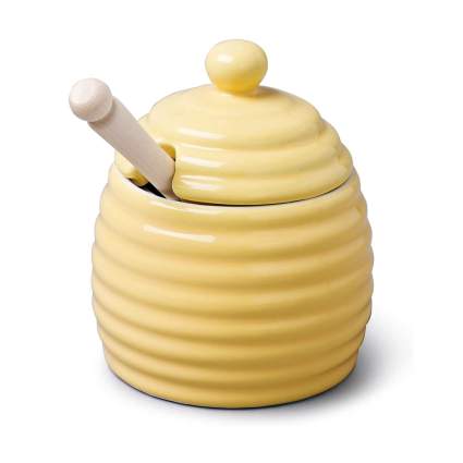 honey pot with wooden dipper