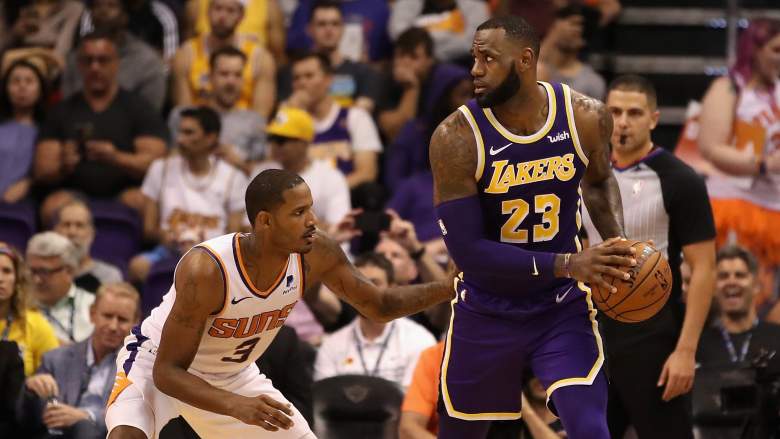 Trevor Ariza, left, defends LeBron James of the Lakers