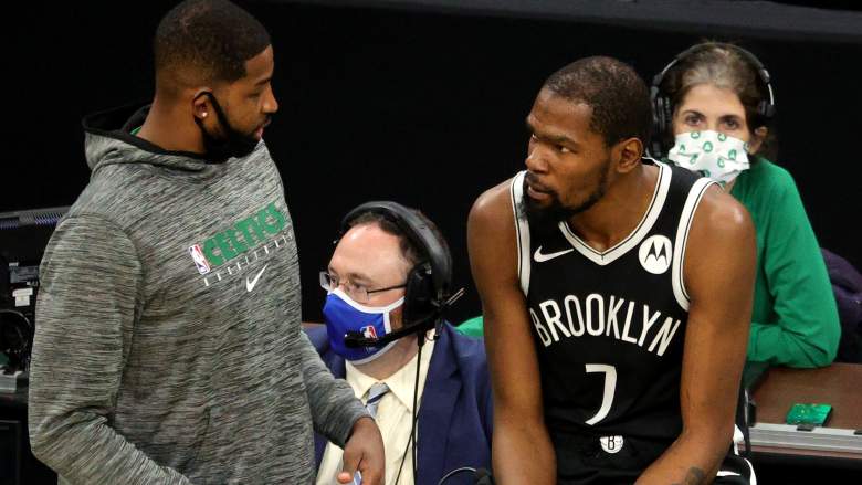 Tristan Thompson, left, talks with the Nets' Kevin Durant.