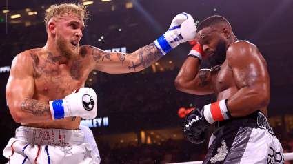 Fans Think Jake Paul Gave Secret Hand Signal to Woodley Before KO