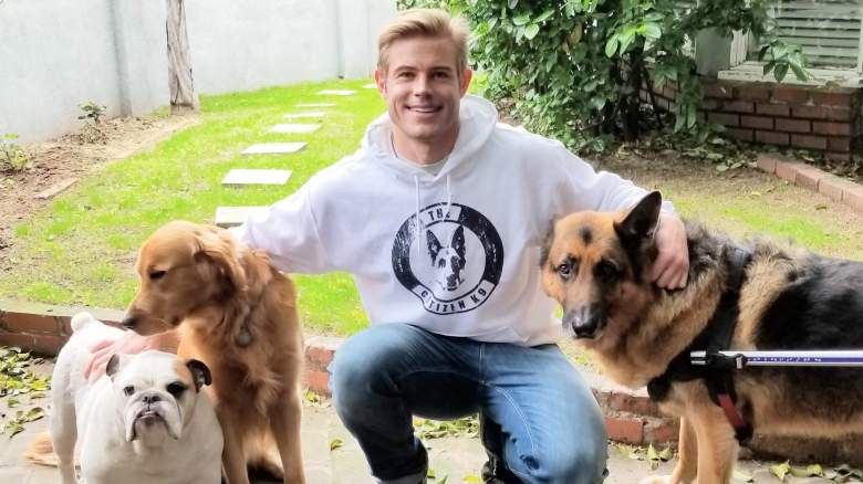 Trevor Donovan with his three dogs.