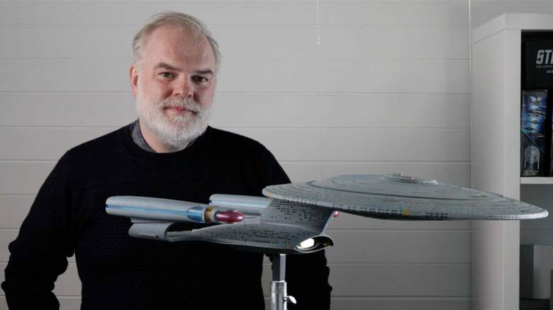 Ben Robinson with the Enterprise-D build model