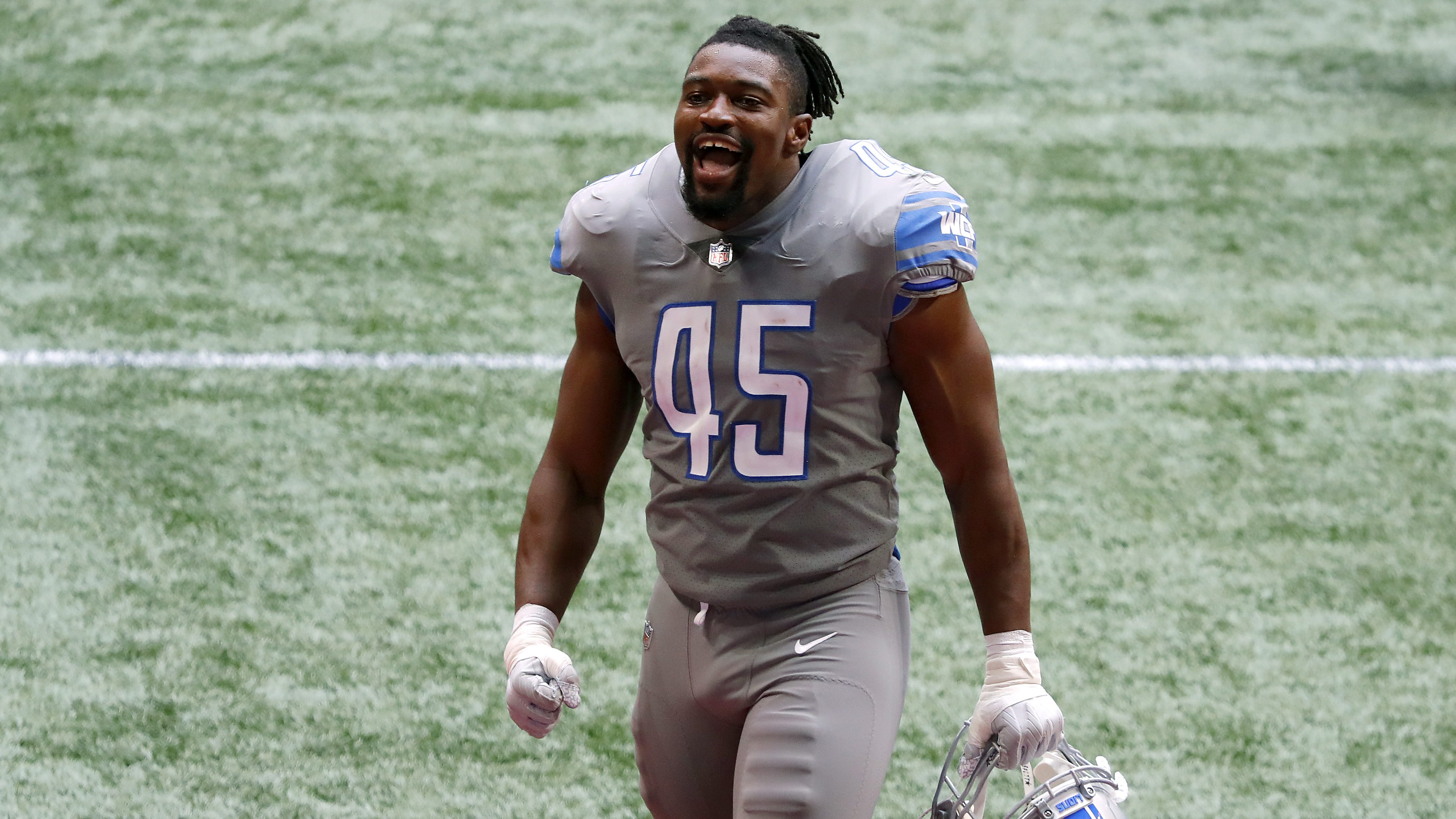 Jason Cabinda of the Detroit Lions runs the ball against the New