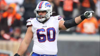 Photo of Bills Center Signing Contract Features Wife’s Personal Item