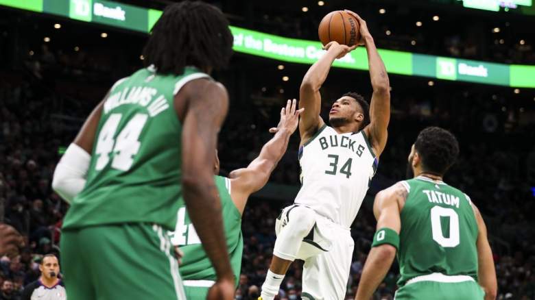Giannis Antetokounmpo of the Milwaukee Bucks being defended by the Boston Celtics.
