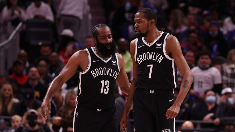 James Harden celebrates with Kevin Durant on the Nets