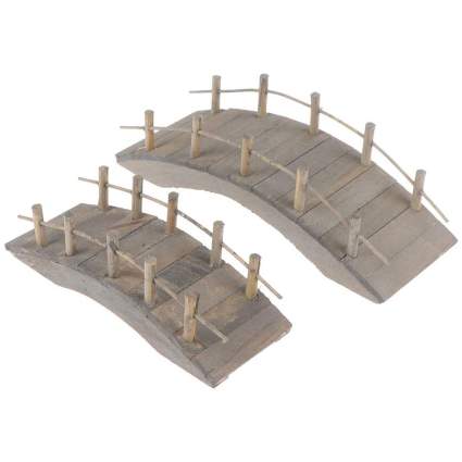 two curved wooden miniature bridges