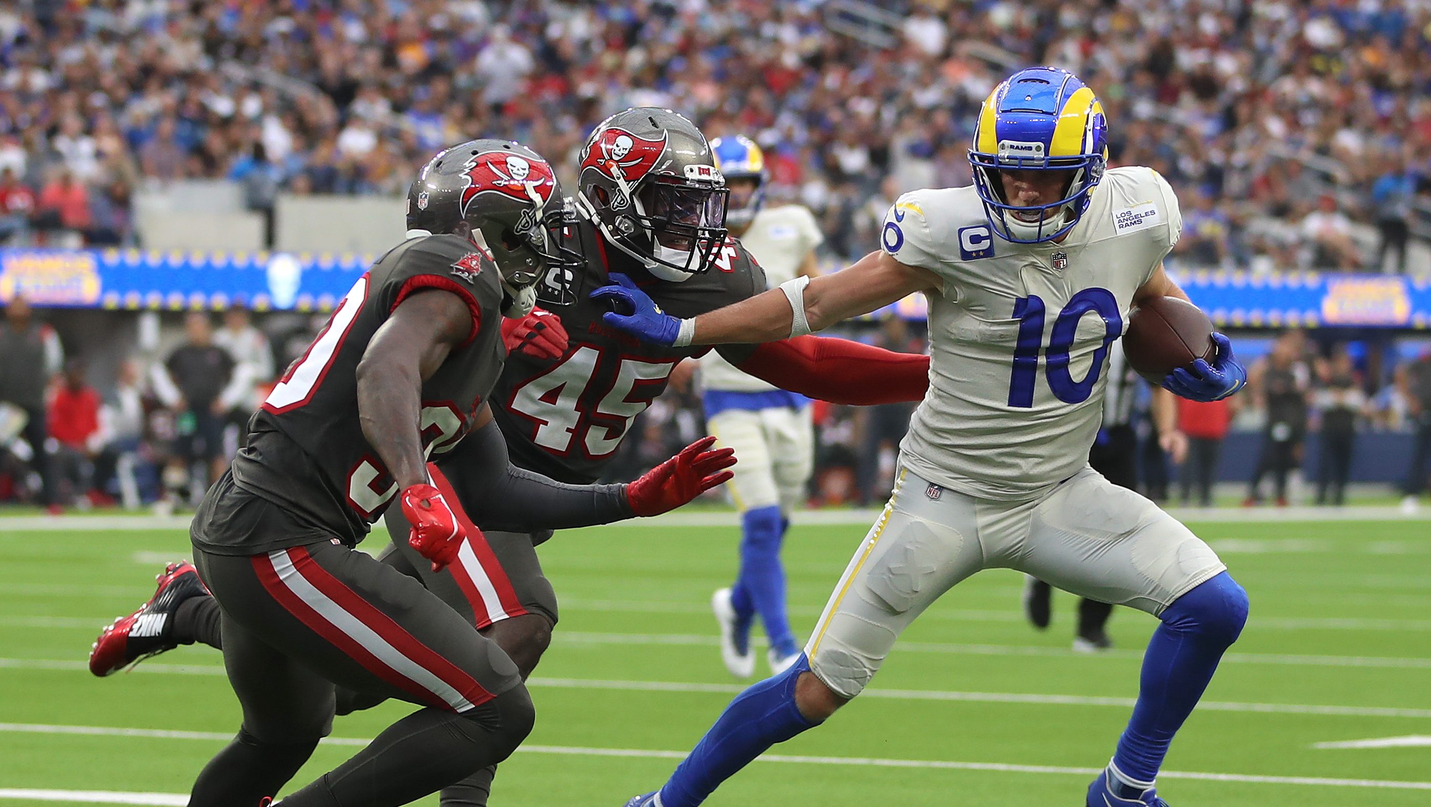 Matthew Stafford of the Los Angeles Rams hands the Vince Lombardi News  Photo - Getty Images