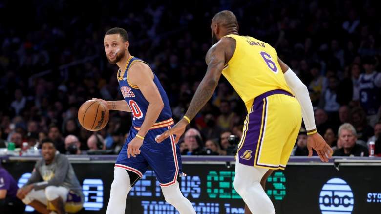 LeBron James guards Stephen Curry