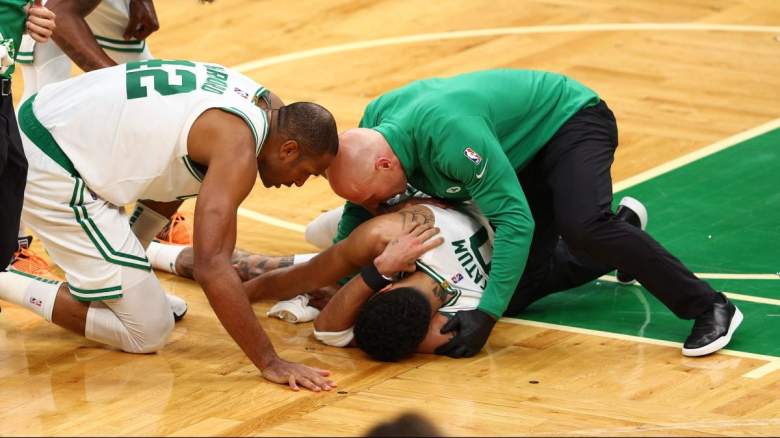 Jayson Tatum of the Boston Celtics after suffering an apparent upper-body injury.