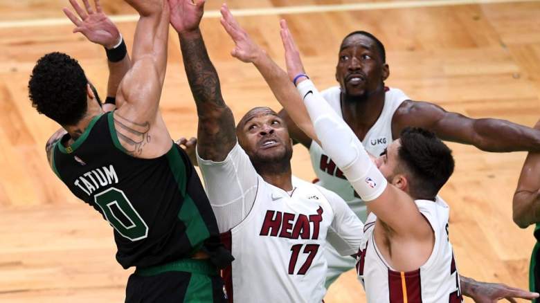PJ Tucker of the Miami Heat defends Jayson Tatum of the Boston Celtics.