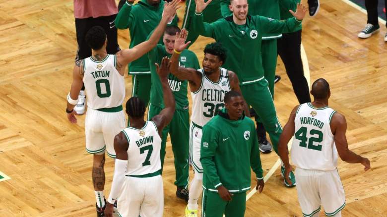 Multiple members of the Boston Celtics.