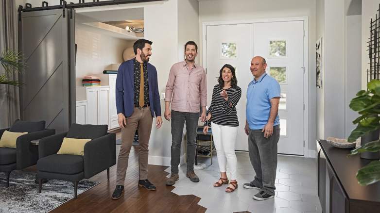 "Property Brothers" Jonathan and Drew Scott with homeowners