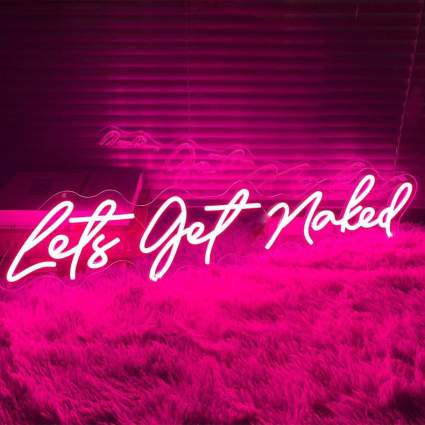 Pink neon "let's get naked" sign
