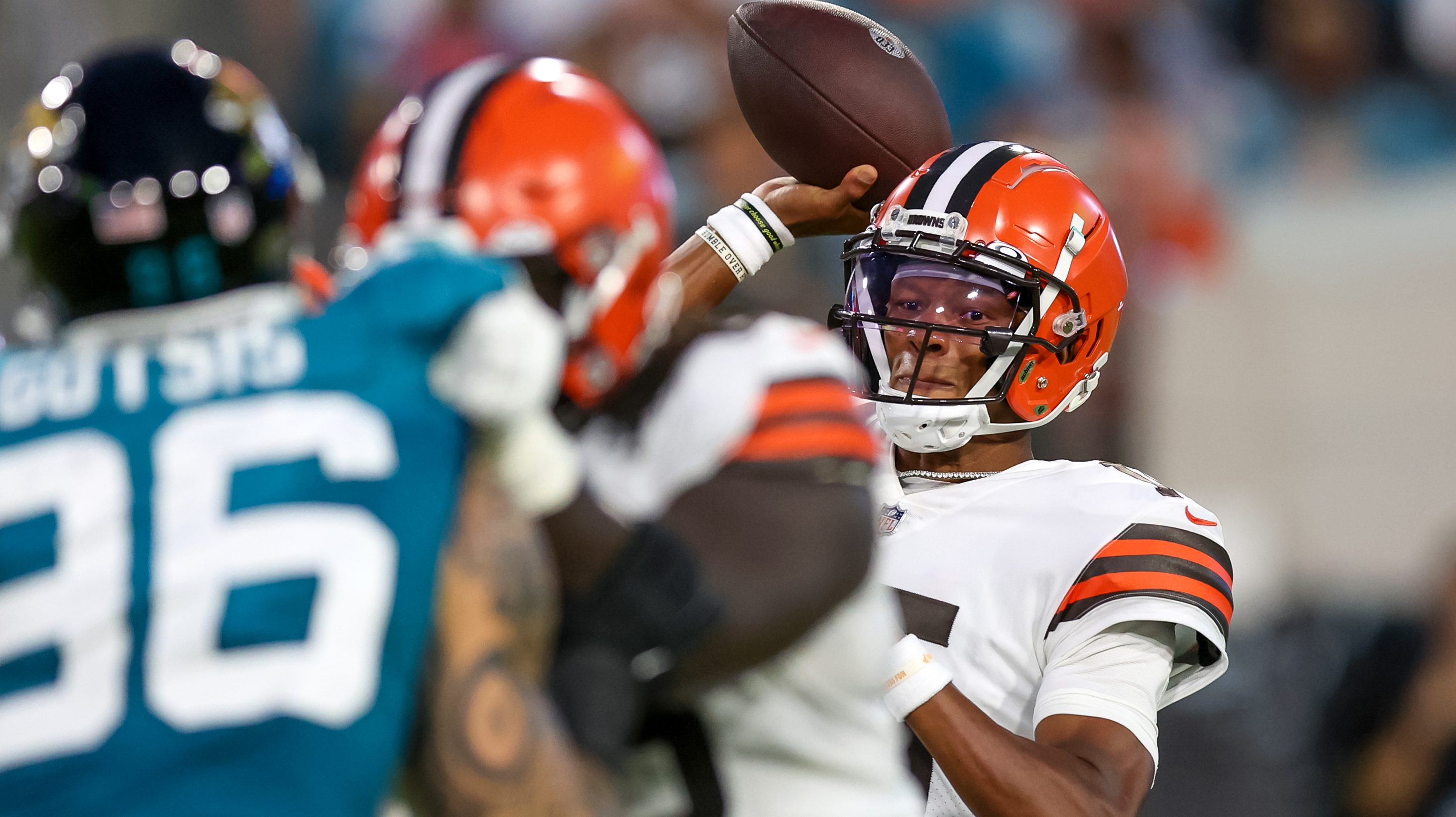 Quarterback Jacoby Brissett of the Cleveland Browns scrambles with