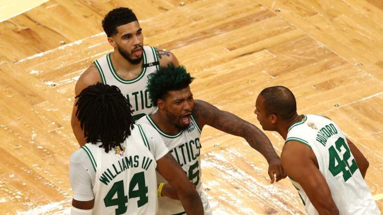 Robert Williams, Jayson Tatum, Marcus Smart, and Al Horford of the Boston Celtics.