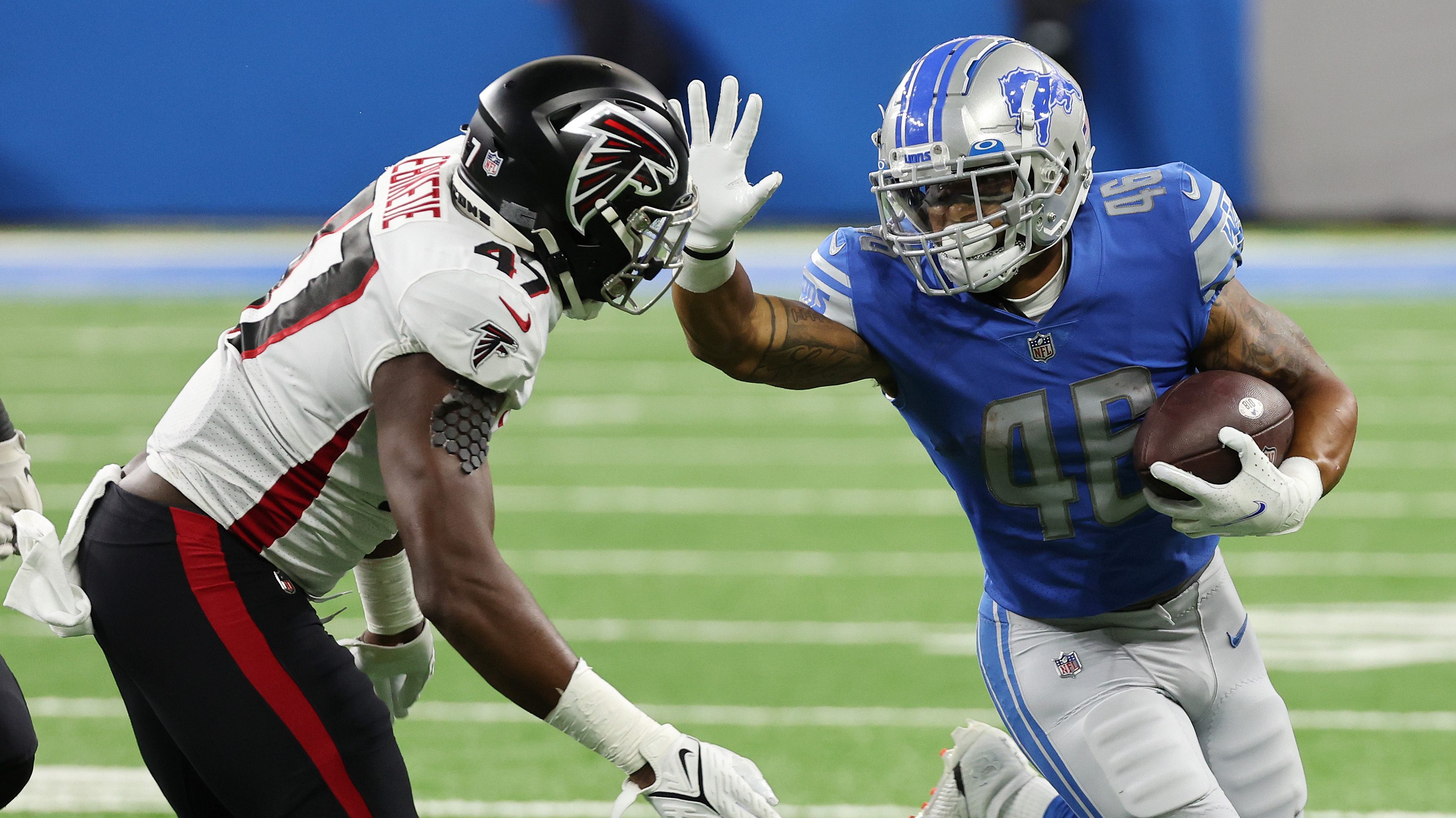 Detroit Lions running back Craig Reynolds (13) looks on against