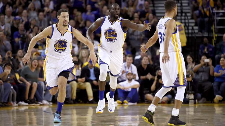 Klay Thompson (left), Draymond Green and Stephen Curry of the Warriors