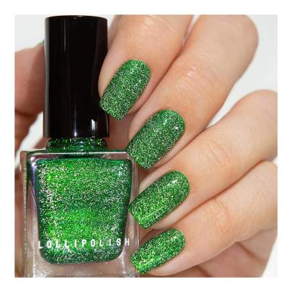 Green glitter nail polish and watches