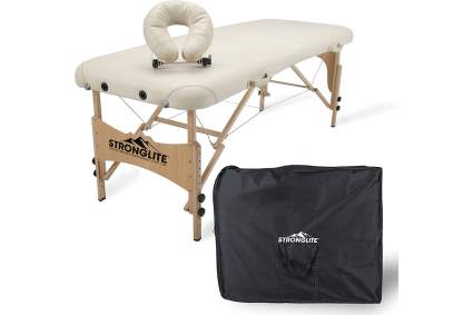 cream colored portable massage table