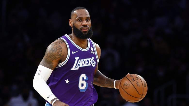 Lakers star LeBron James dribbles the ball during the 2021-22 season