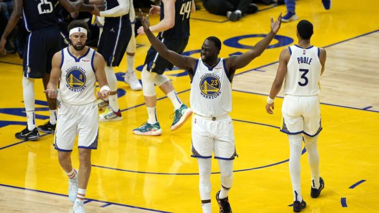Klay Thompson, Draymond Green, and Jordan Poole of the Golden State Warriors.