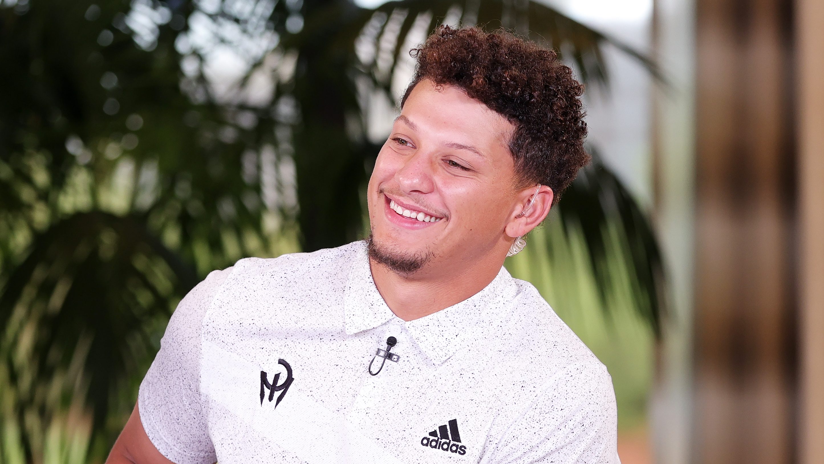 Patrick Mahomes Suits Up in Plaid & Oakley for Super Bowl 2023