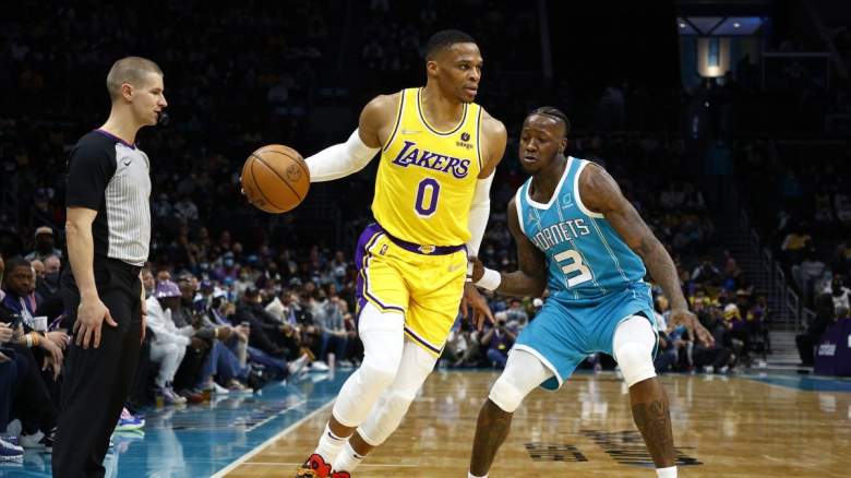 Hornets guard Terry Rozier guards Lakers star Russell Westbrook during the 2021-22 season