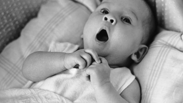 A baby yawning