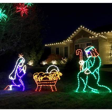 Lighted jesus, mary, and joseph on a lawn