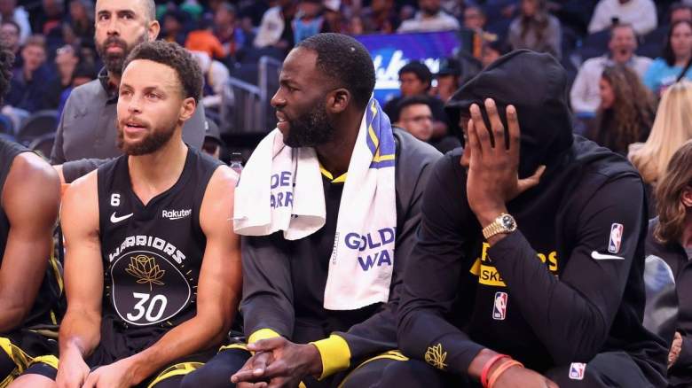 Stephen Curry, Draymond Green, and Jonathan Kuminga of the Golden State Warriors.