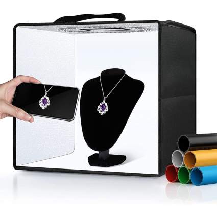 white and black box for shooting images of products with a display for jewelry inside