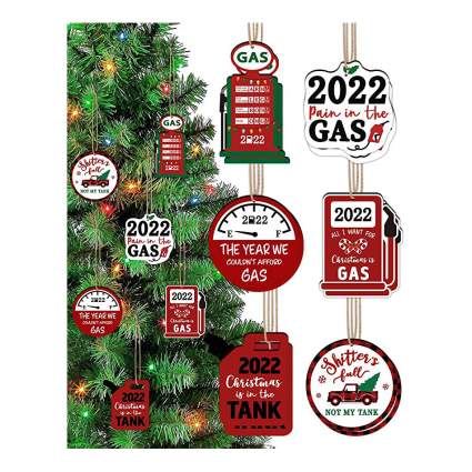 12 red and white ornaments complaining about gas prices