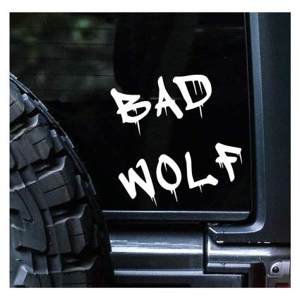 Black jeep with Doctor Who "Bad Wolf" bumper sticker