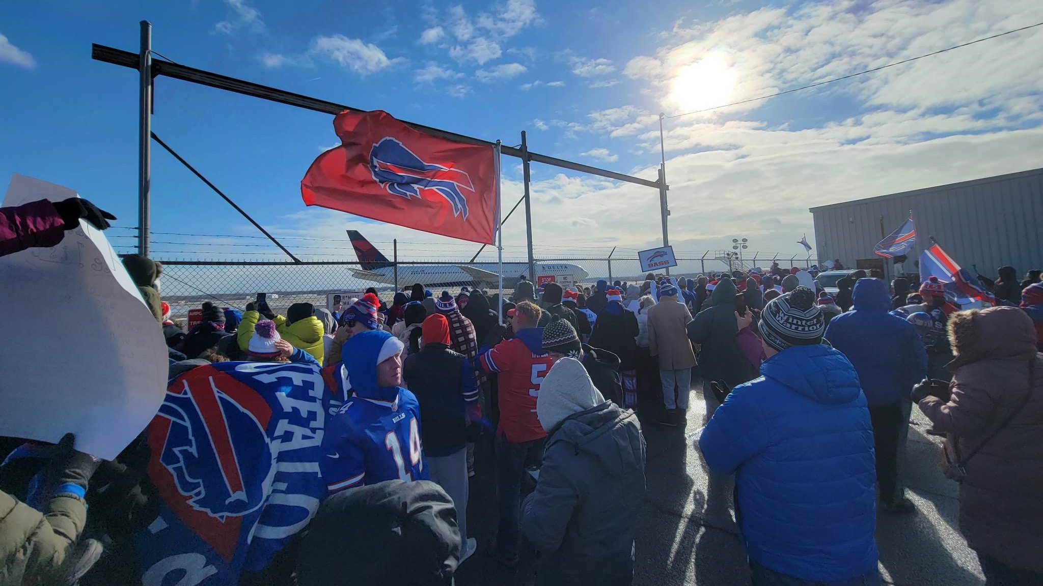 Brown encourages Buffalo Bills fans to celebrate by snapping a selfie at  City Hall banner - and help community by making a winter clothing donation