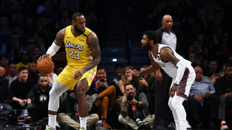 Lakers star LeBron James (left) and Nets guard Kyrie Irving