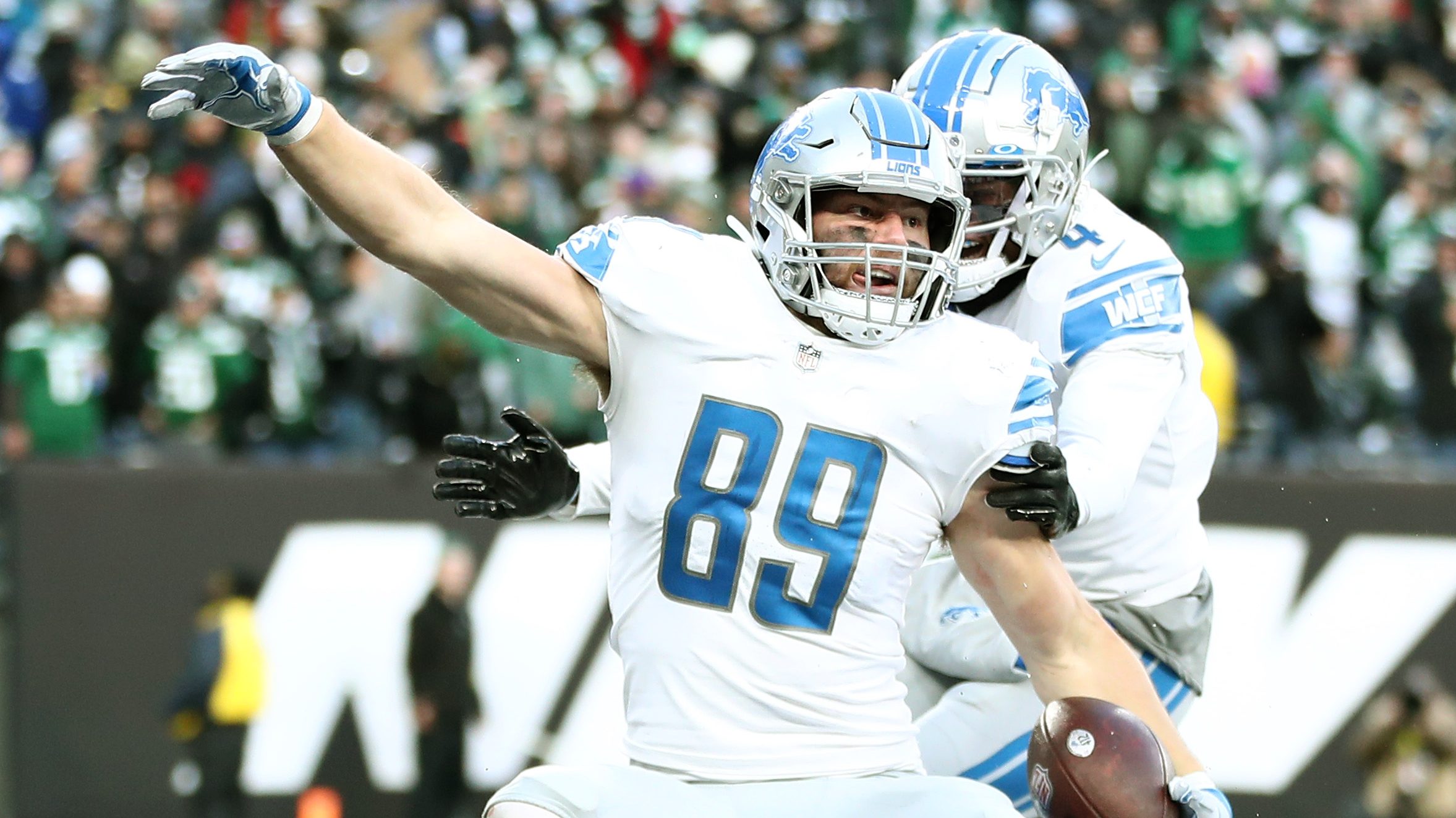 Detroit Lions tight end Brock Wright (89) runs during the first half of an  NFL football