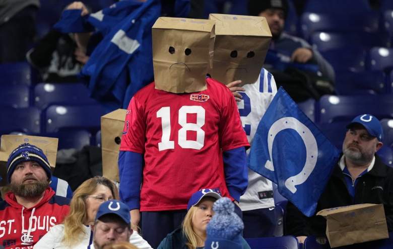 Colts fans in brown paper bags