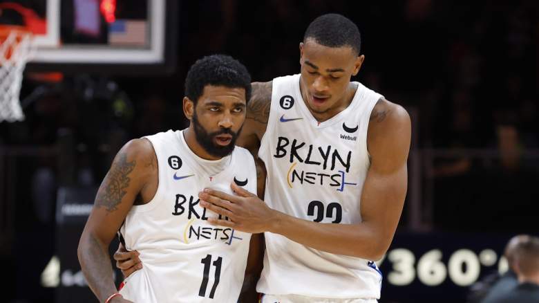 Kyrie Irving and Nic Claxton of the Brooklyn Nets.