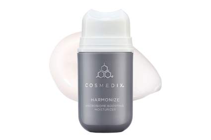 Silver and white bottle of COSMEDIX moisturizer