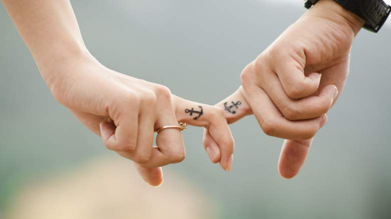A couple with matching tattoos.