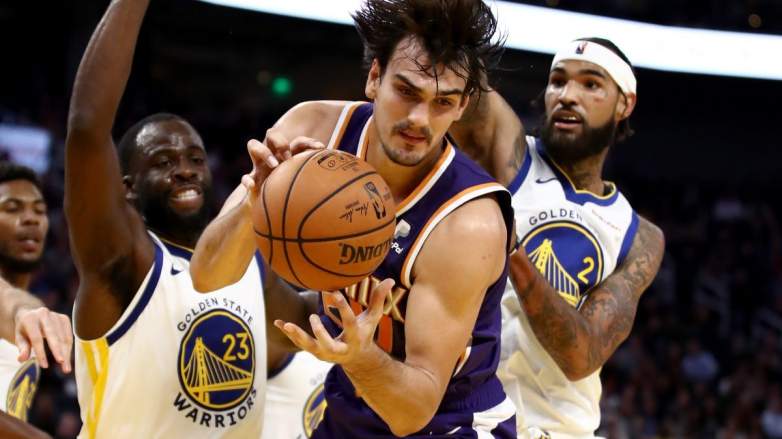 Draymond Green and Willie Cauley-Stein, then of the Golden State Warriors, and Dario Saric, then of the Phoenix Suns.