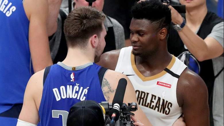 Luka Doncic of the Dallas Mavericks chats with Zion Williamson of the New Orleans Pelicans.
