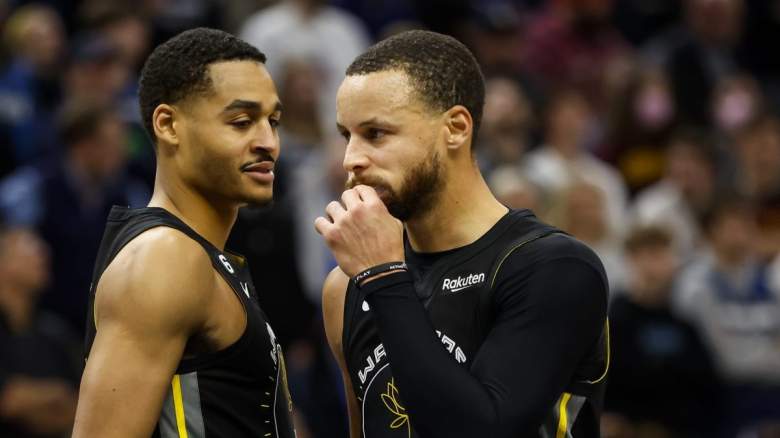 Jordan Poole and Stephen Curry of the Golden State Warriors.