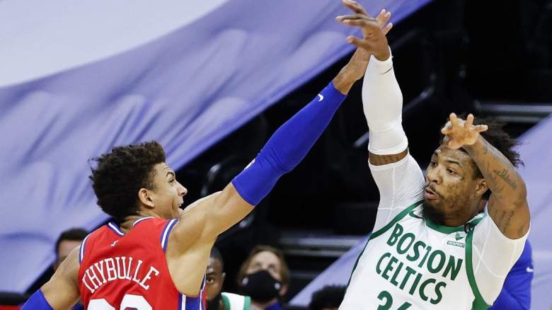 Matisse Thybulle of the Philadelphia 76ers guards Marcus Smart of the Boston Celtics.