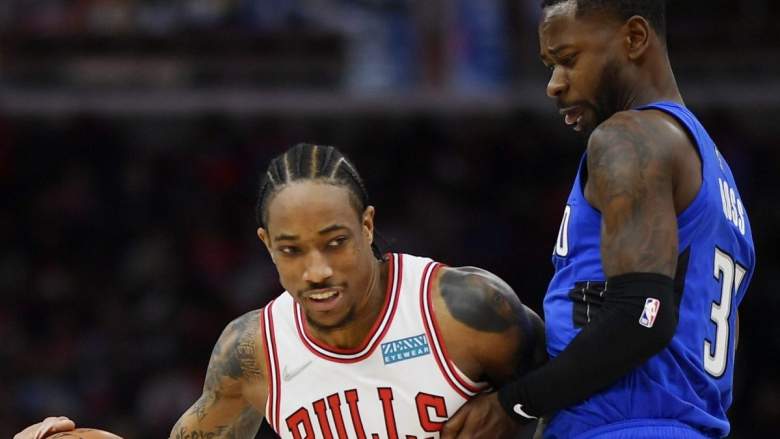 Terrence Ross of the Orlando Magic guards Demar DeRozen of the Chicago Bulls. Ross has been linked to the Dallas Mavericks.