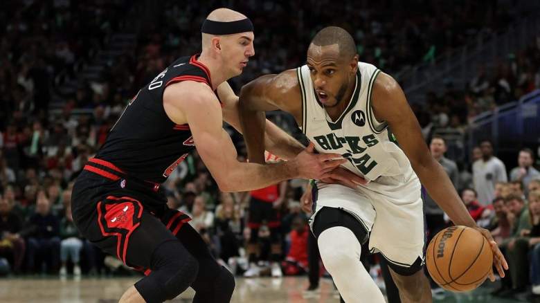 Alex Caruso of the Chicago Bulls guards Khris Middleton of the Milwaukee Bucks. The Golden State Warriors had interest in trading for Caruso at the trade deadline.