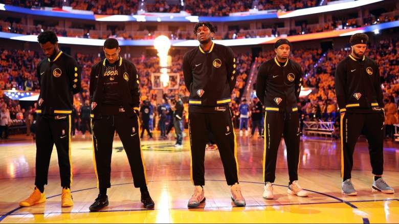 Andrew Wiggins #22, Jordan Poole #3, Kevon Looney #5, Moses Moody # and Klay Thompson #11 of the Golden State Warriors.