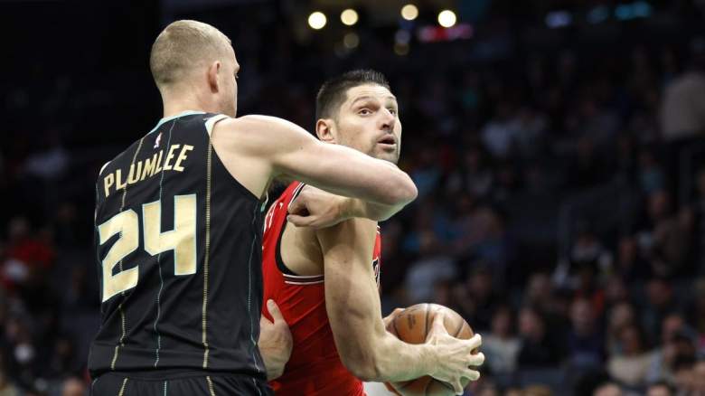 Mason Plumlee of the Charlotte Hornets guards Nikola Vucevic of the Chicago Bulls. Plumlee has been labeled as a potential buyout candidate for the Golden State Warriors.