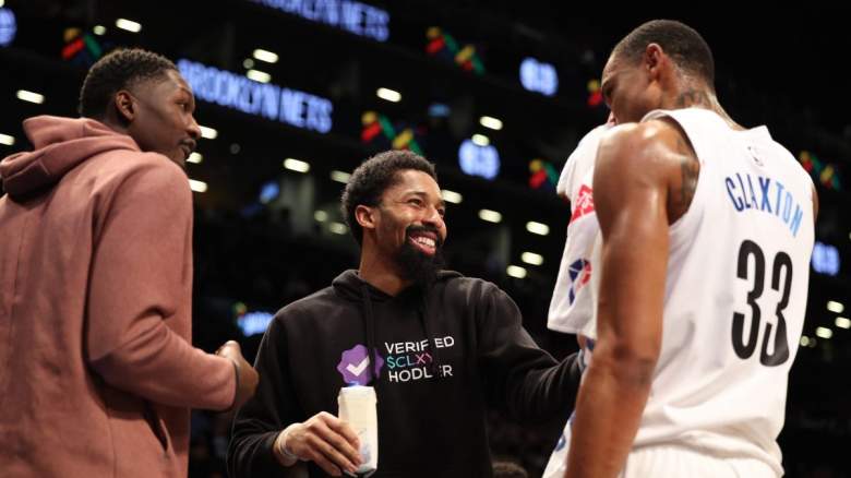 Dorian Finney-Smith, Spencer Dinwiddie, and Nic Claxton of the Brooklyn Nets.